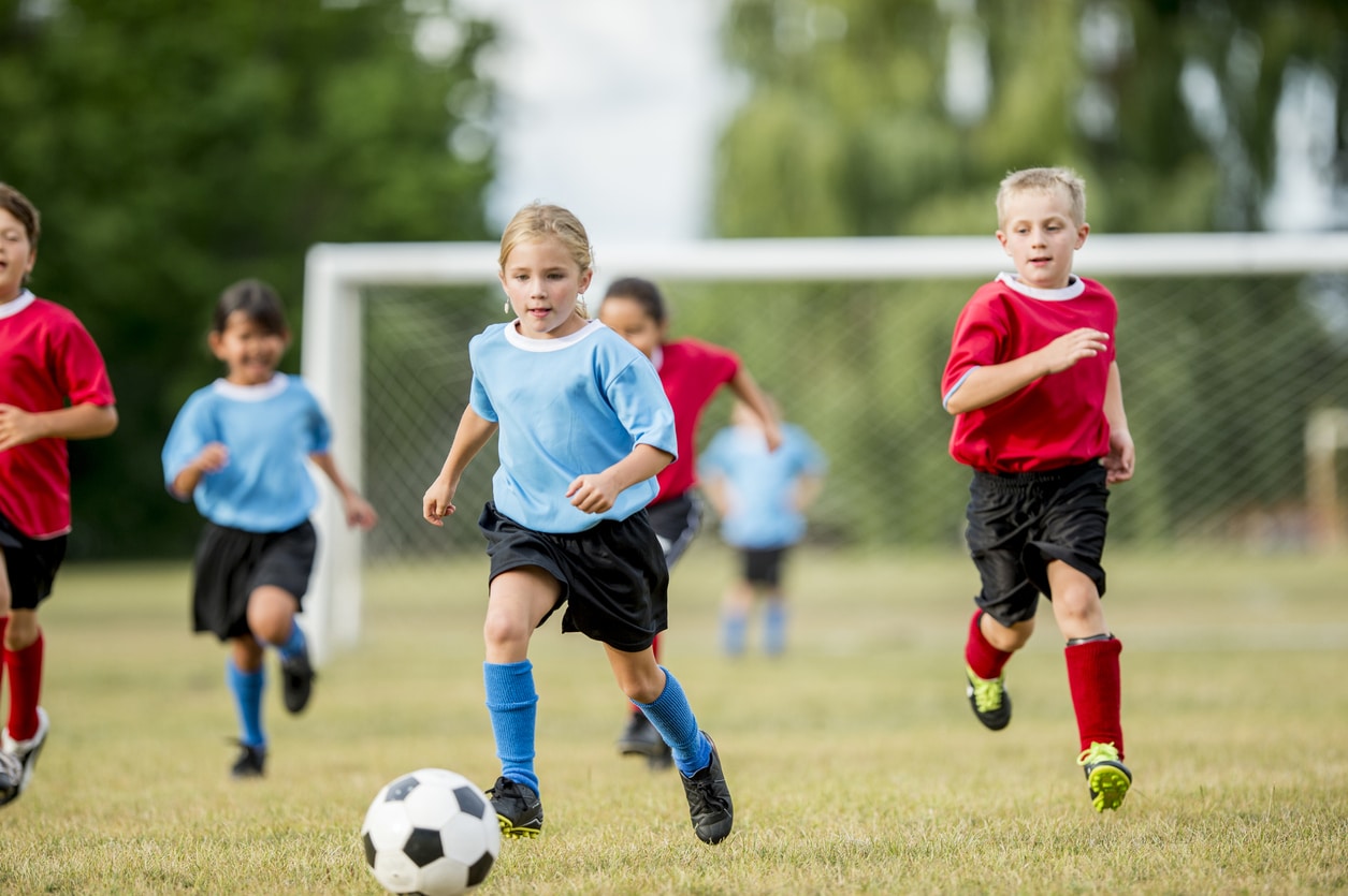 Girl Playing Soccer